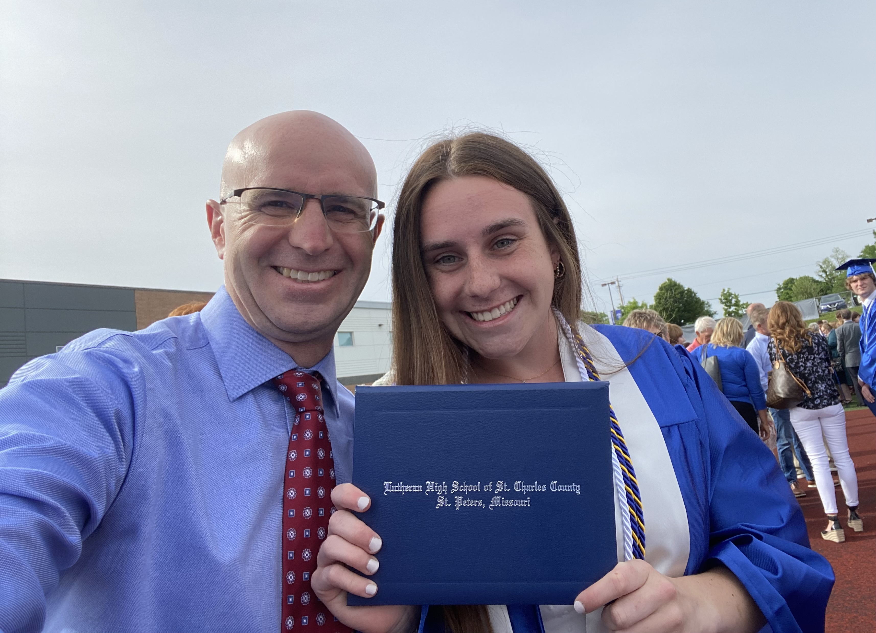 Image of Allison and Dad on graduation day